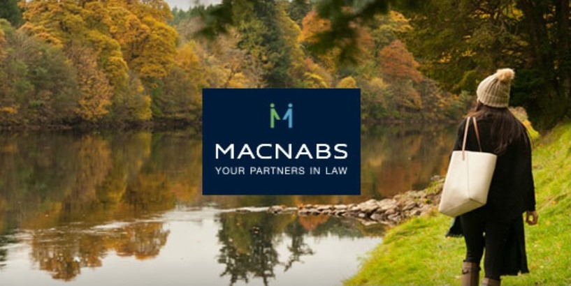 Mcnabs Solicitors Logo over Scottish Riverbank scene