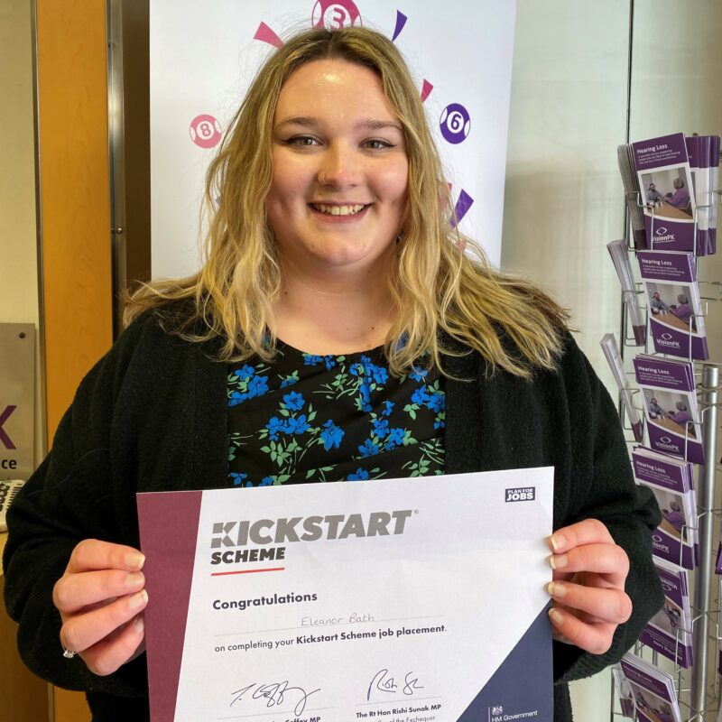 Eleanor Bath holding up a Kickstart certificate