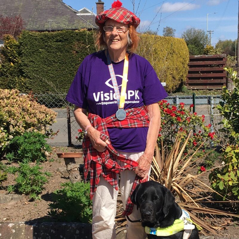 A picture of Val & Jorja after the Kiltwalk with their medal.
